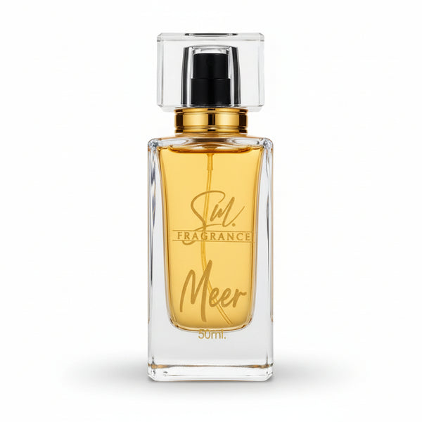 Perfume bottle labeled 'Stil Fragrance Meer' on a beige cushion with a decorative background